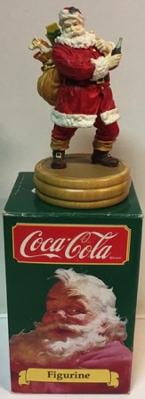 4417-1 € 27,50 coca cola beeldje kerstman met rugzak ca 12 cm